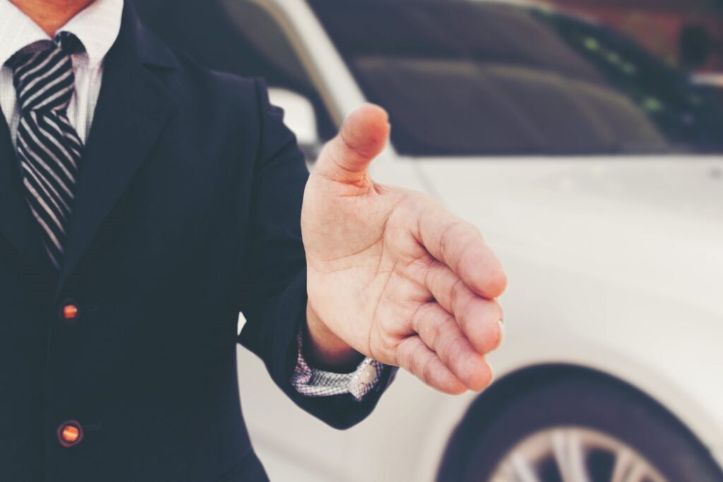 car salesman at dealership