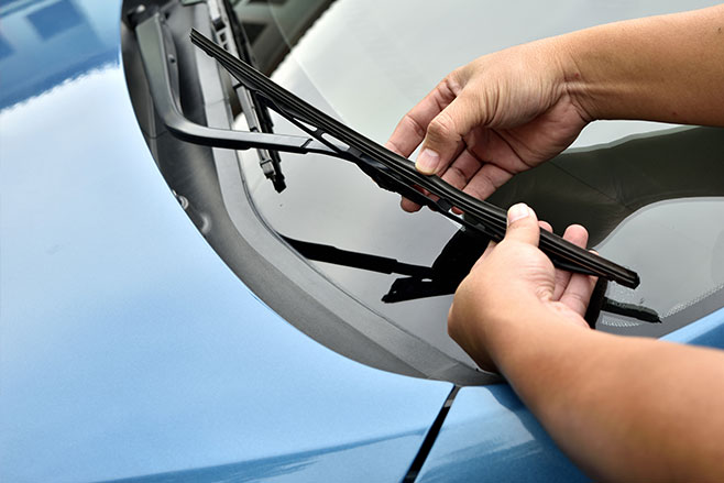 Driving in rain windscreen wipers