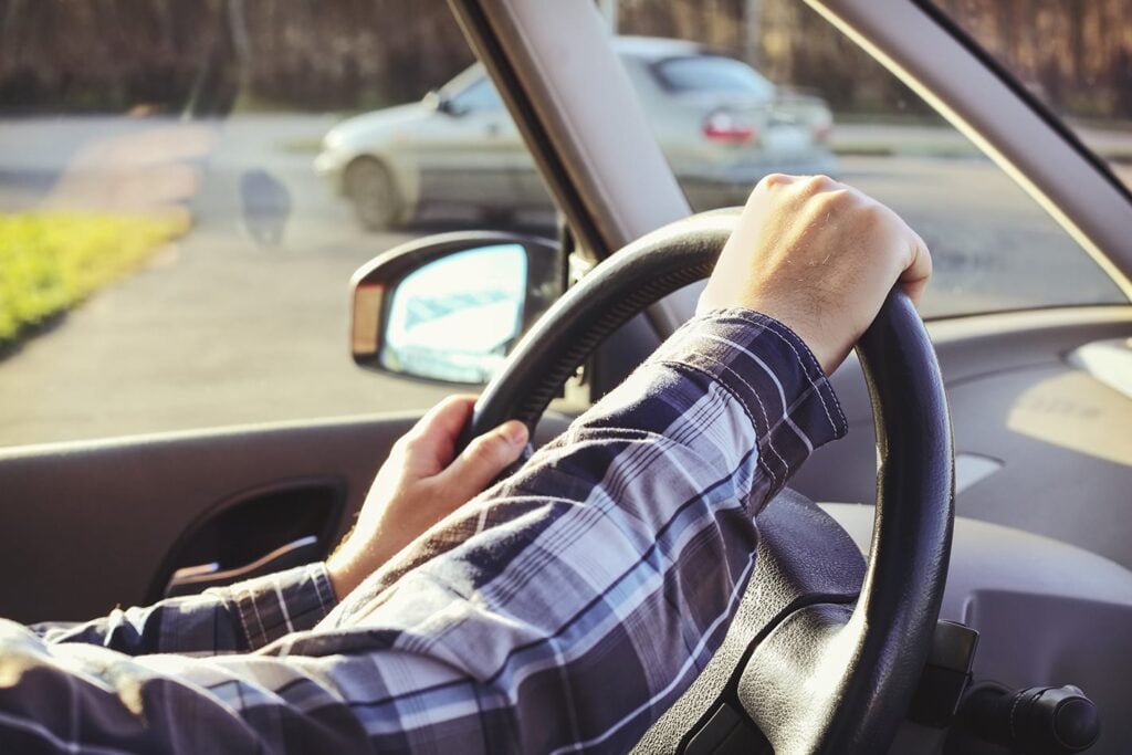 man driving at training course