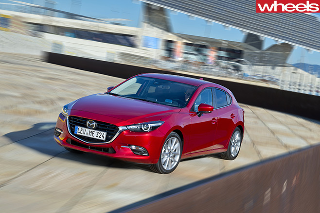 Mazda -3-driving