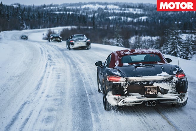 Porsche 718 Boxster driving rear