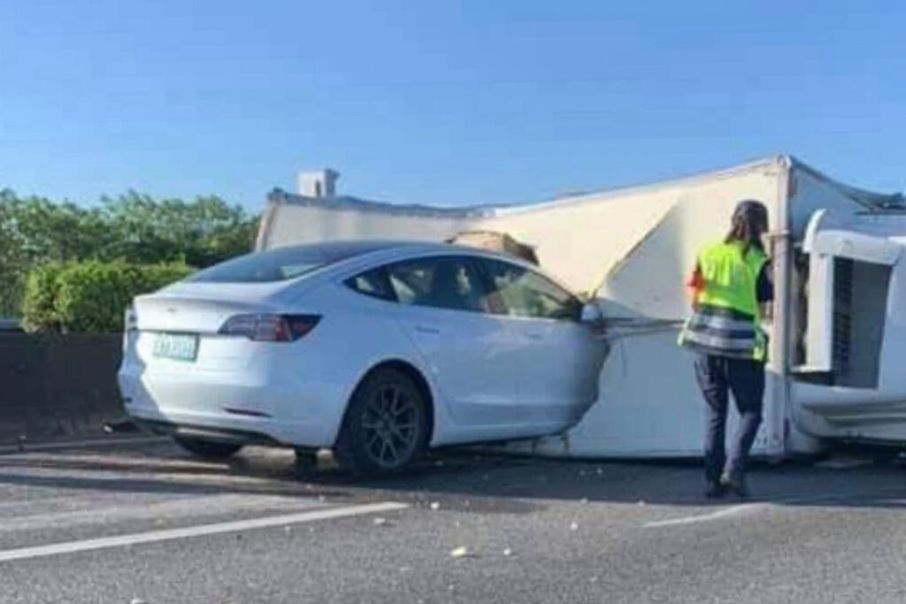 Watch a Tesla Model 3 drive itself straight into a truck