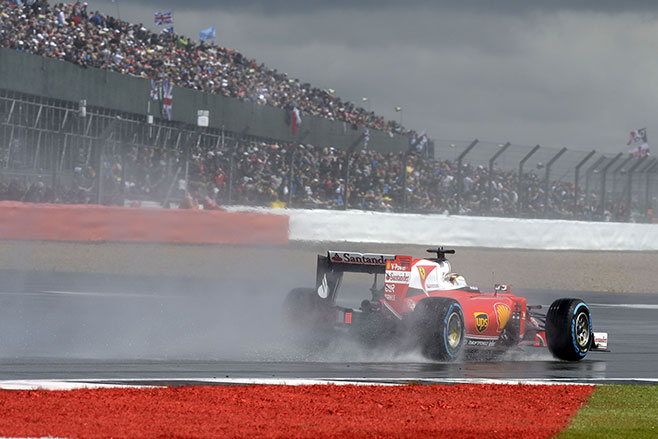 Ferrari drivers Kimi Raikkonen and Sebastian Vettel