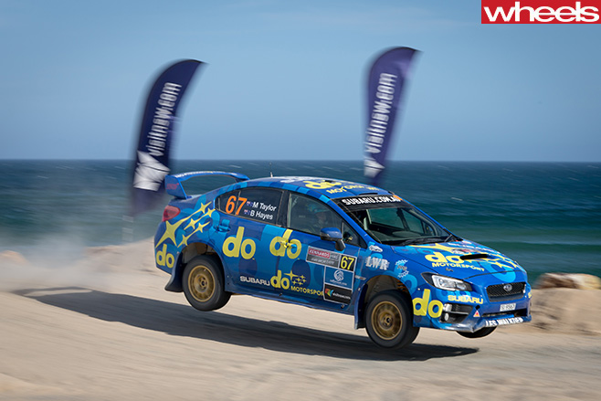 Molly -Taylor -Suburu -WRX-Sti -jump