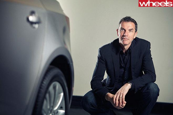 Mike -Simcoe -sitting -with -car