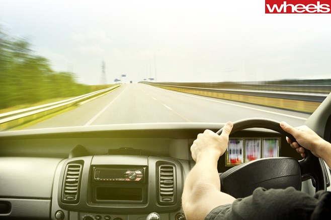 Person -driving -in -car -taking -a -gamble -with -speed-