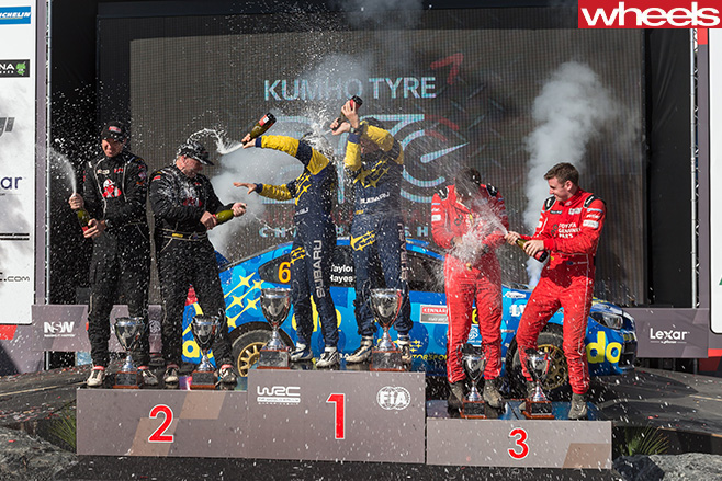 Podium -drivers -celebrating