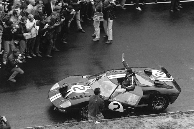 Race -car -Chris -Amon -waving