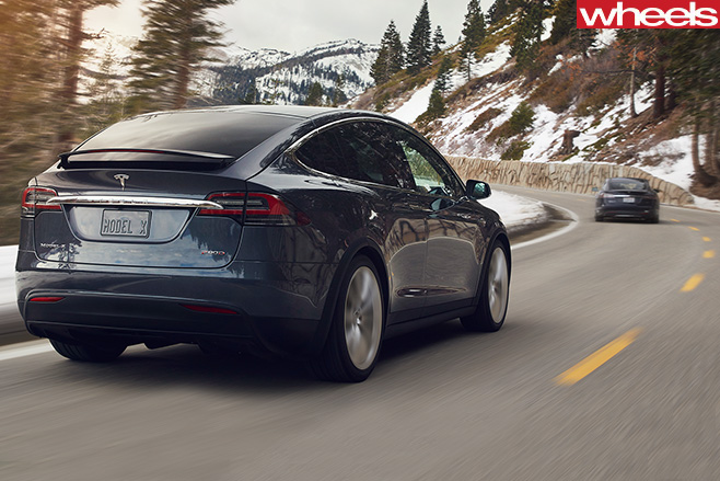 Tesla -Model -X-driving -rear -mountain -pass