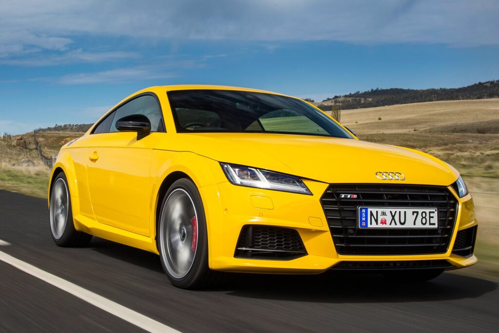 Audi TTS driving on road