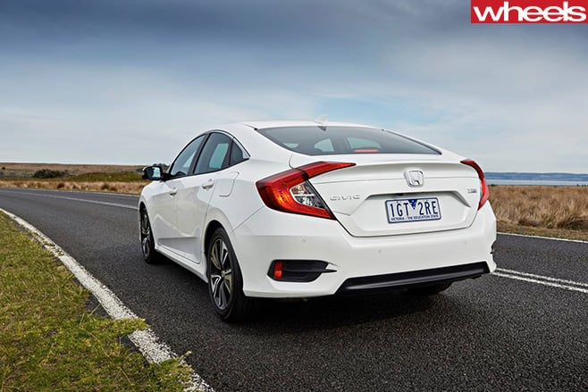 Honda -Civic -VTi -LX-rear -side -on -road