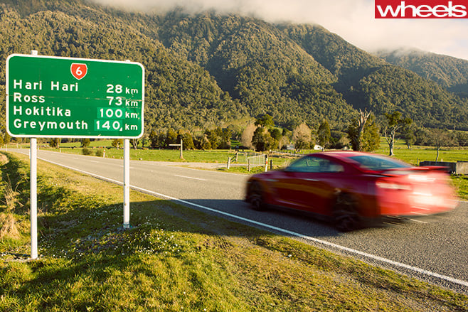 Nissan -GT-R-rear -driving -NZ-road