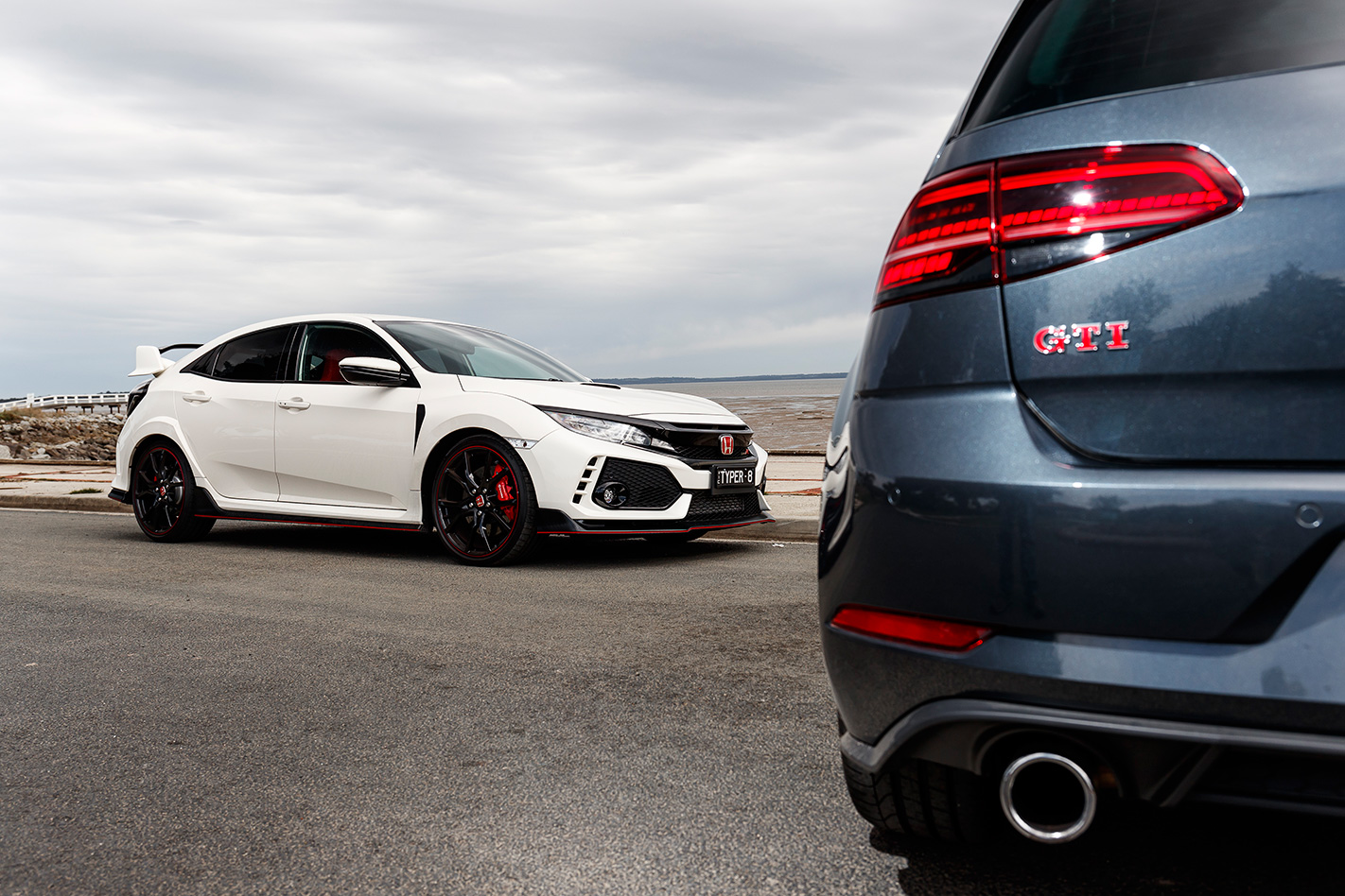 Volkswagen Golf GTI P vs Honda Civic Type R side.jpg