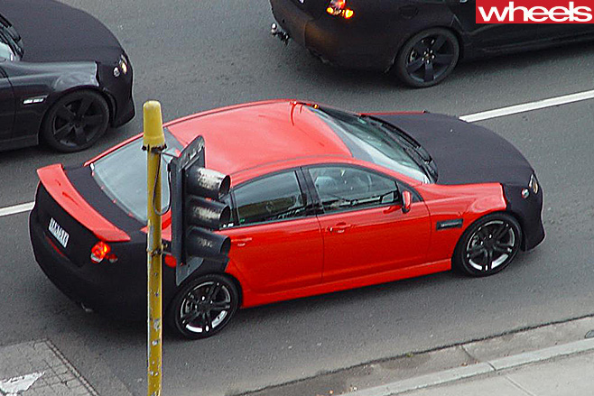 Holden -VE-Commodore -camo -top -side
