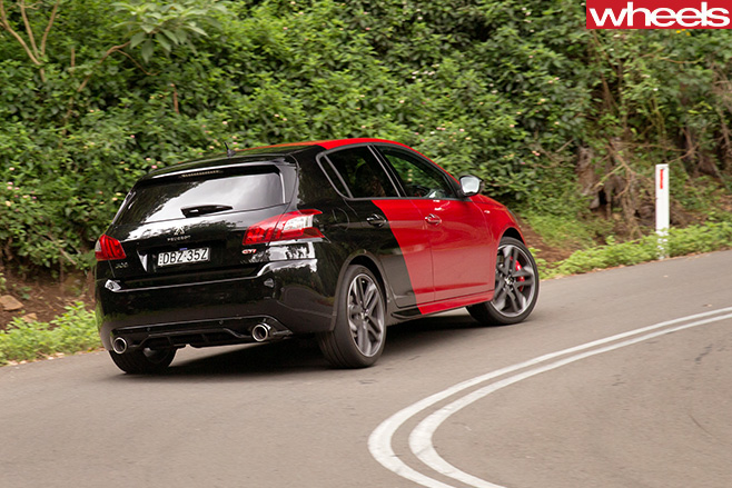 Peugeot -308-gti -driving -rear-