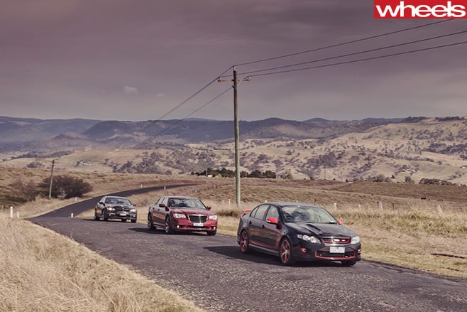 2012-FPV-GT-R-Spec -vs -Chrysler -300-SRT8-vs -HSV-Clubsport -R8-driving -front -side