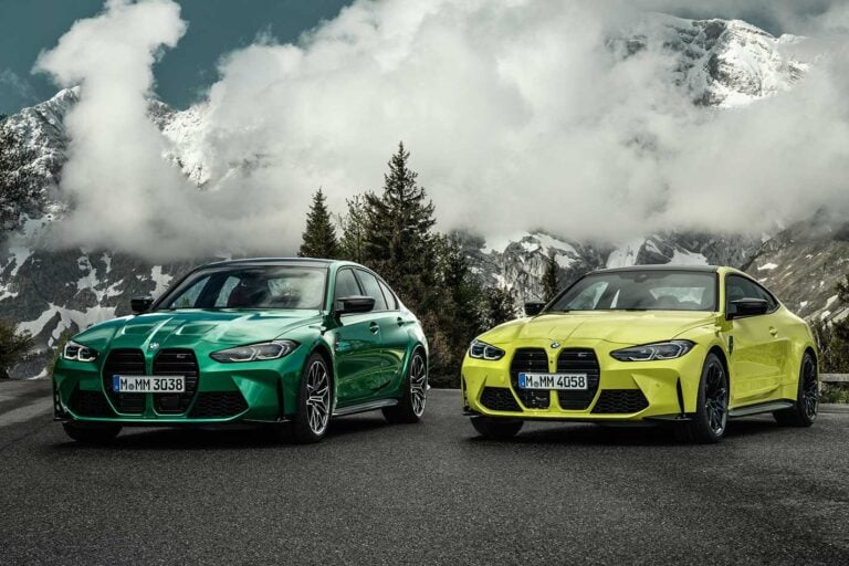 2021 BMW M3 Competition and M4 Competition parked together.
