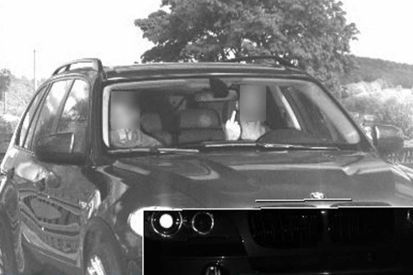 BMW driver gives camera the bird