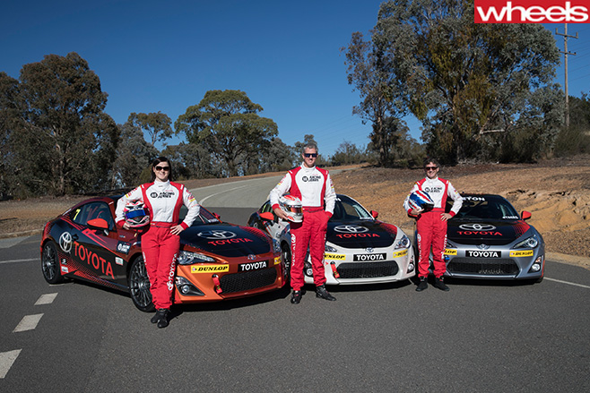 Glenn -Seton -standing -with -racing -car -driver-
