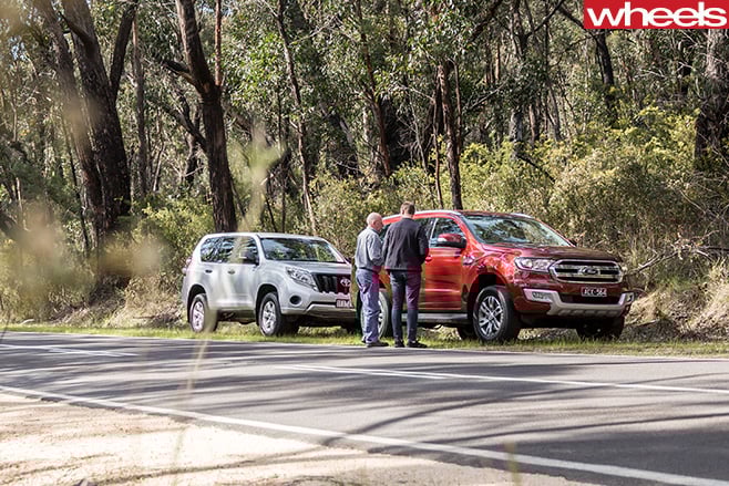 Ford -Everest -and -Toyota -Prado -parked -side -road