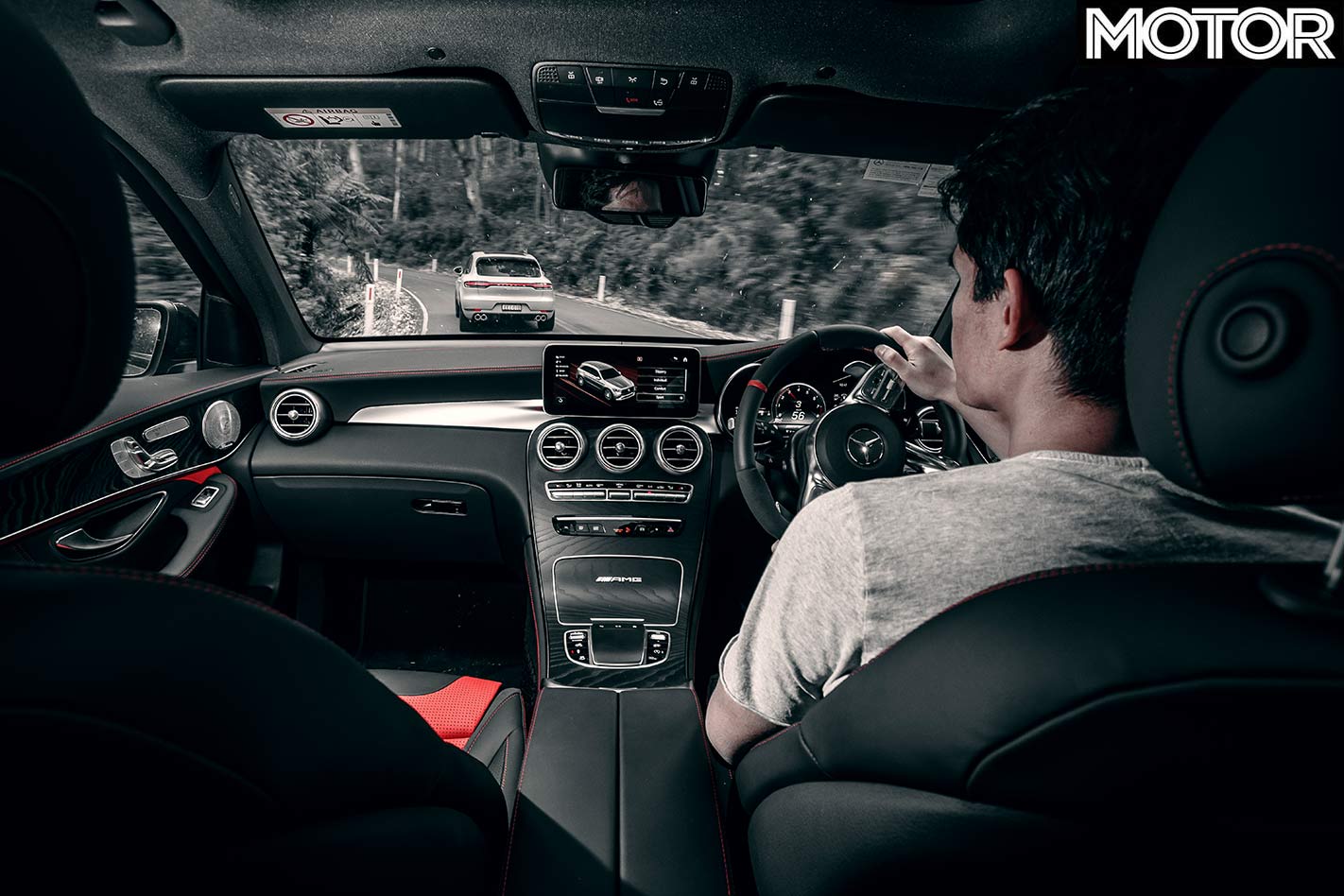 Porsche Macan Turbo v Mercedes-Benz GLC63 S driving