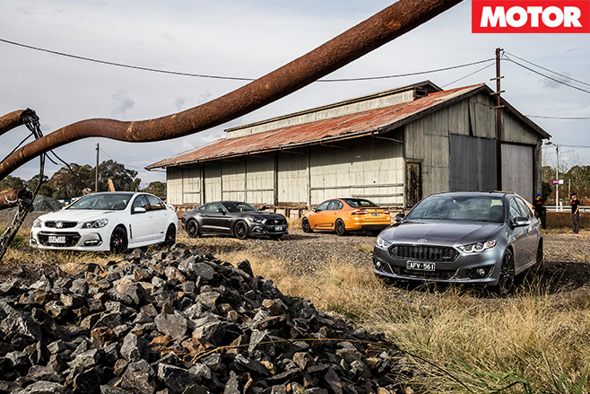 4 cars sitting still