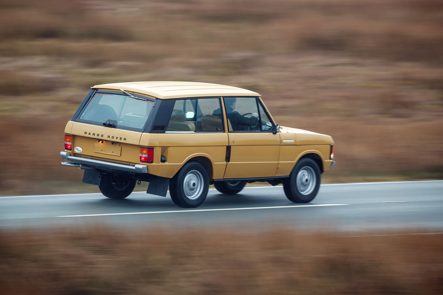 Range Rover rear three quarter driving
