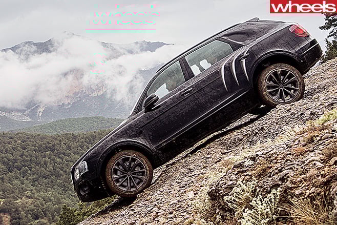 Bentley -Bentayga -driving -down -hill