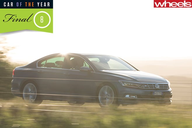 VW-Passat -driving -sun -shining