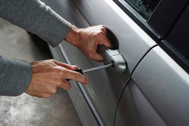 Person jimmying lock