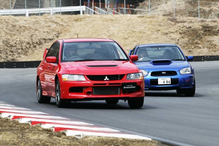 2005 Mitsubishi Lancer Evolution IX vs Subaru Impreza WRX STi comparison review