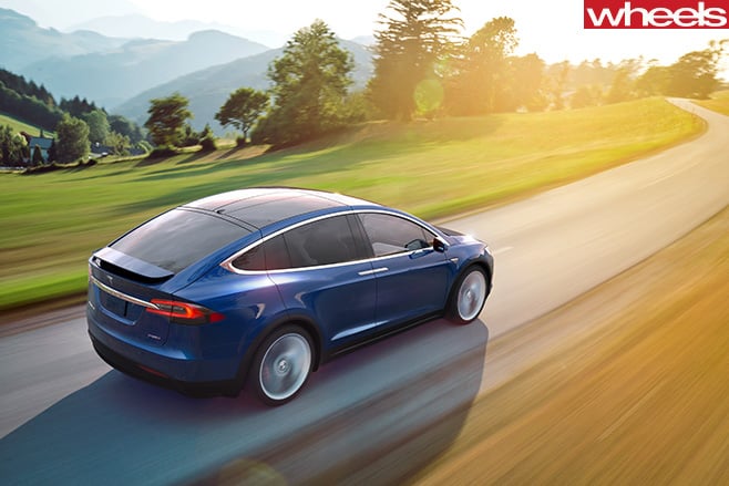 Tesla -Model -X-driving -rear