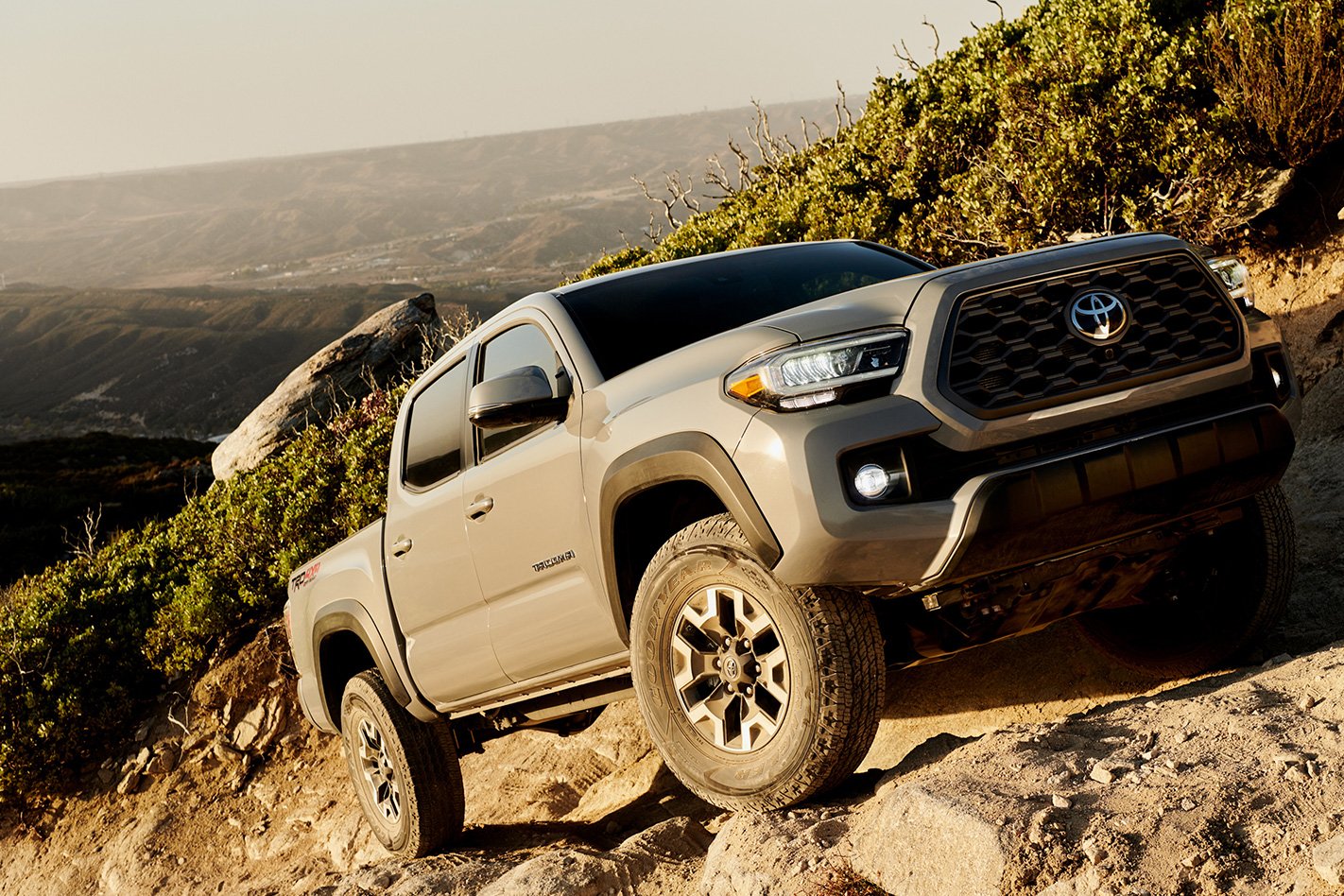 toyota tacoma climbing up a hill