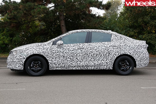2017-Opel -Astra -sedan -spy -driving -side