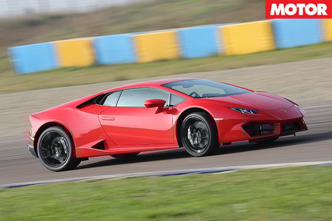 Lamborghini Huracán driving fast side