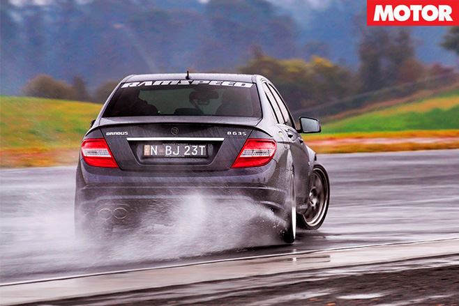 Grey merc rear driving