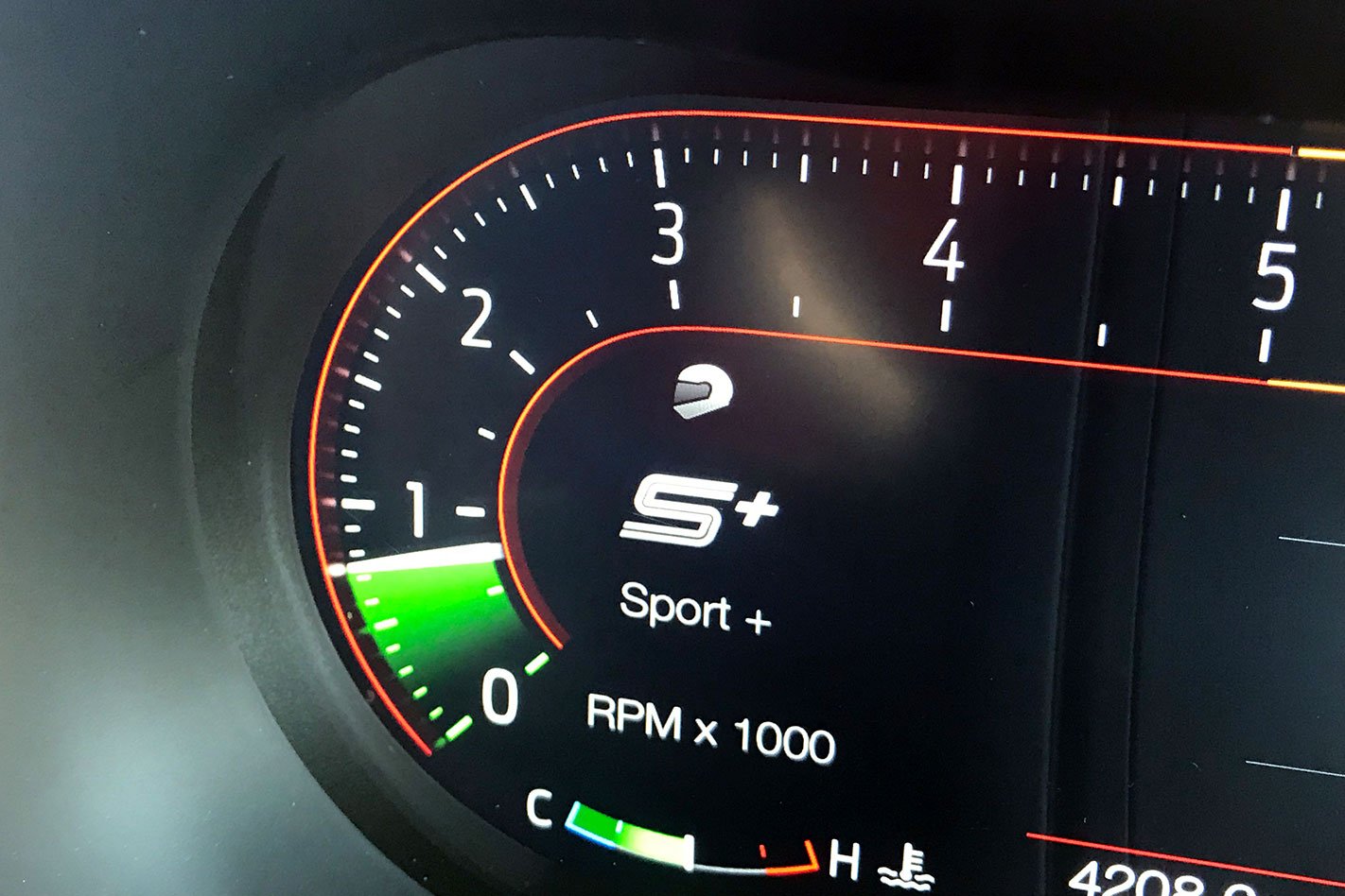 Digital tachometer displaying 6000rpm