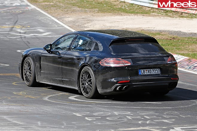 Black -Porsche -Panamera -rear -side
