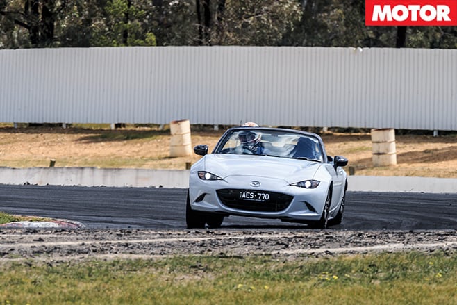 Mazda mx-5 driving on track