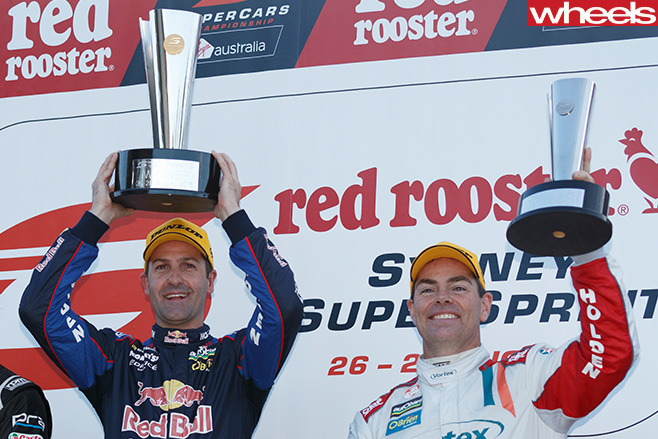 Craig -Lowndes -holding -trophy
