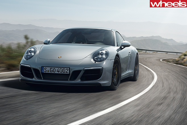 Porsche -911-Carerra -driving -front