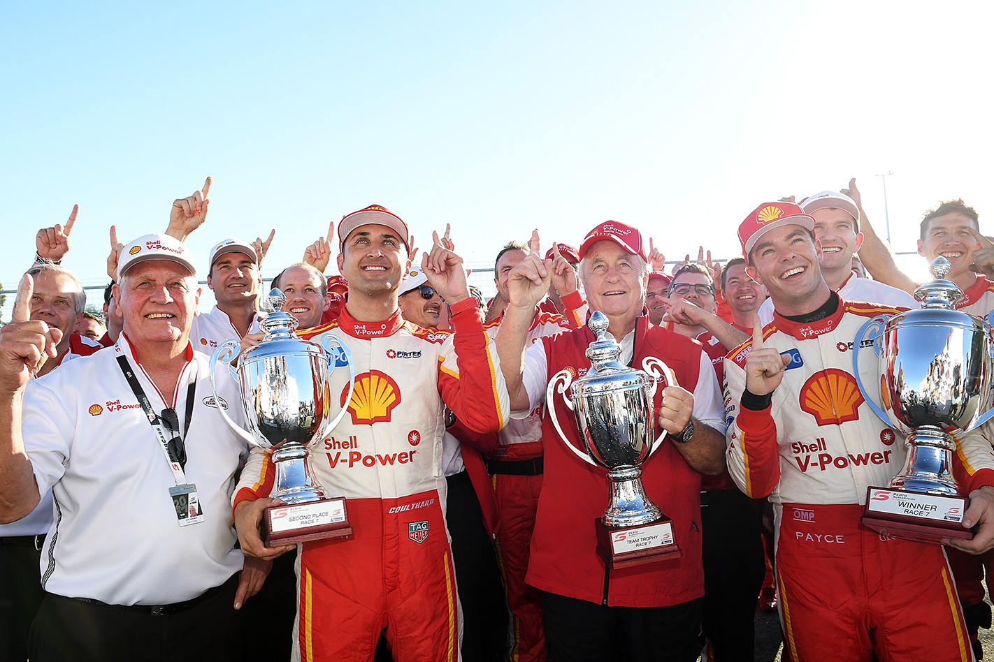 DJR Team Penske & Dick Johnson holding trophies