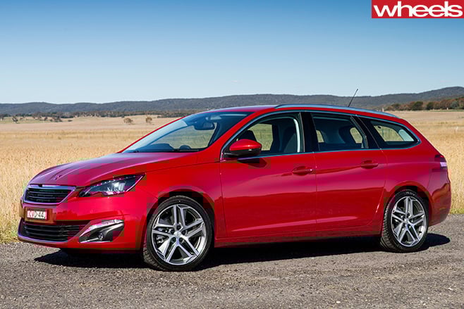 Peugeot -308-front -side -on -gravel -road