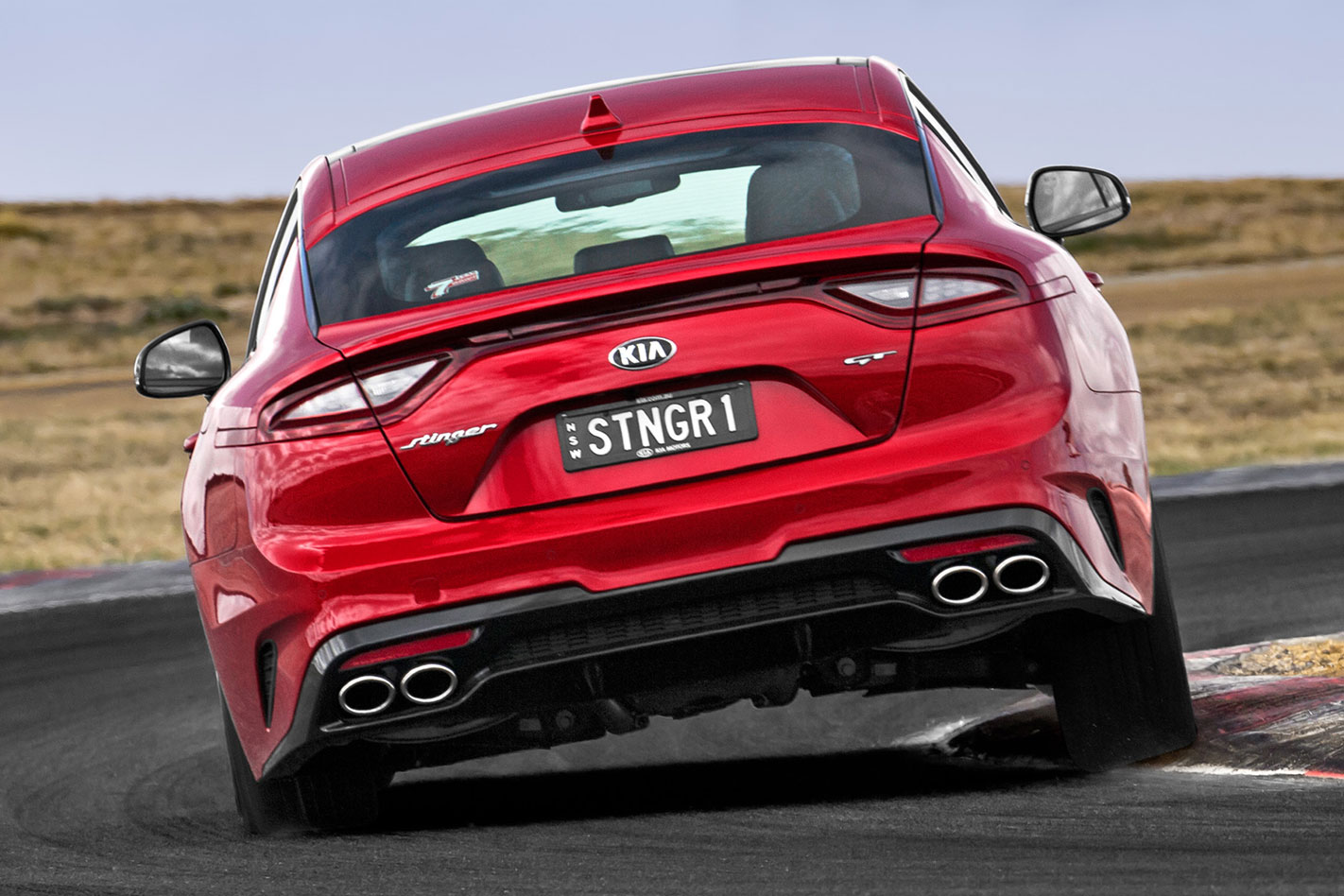 Kia stinger GT rear, on track