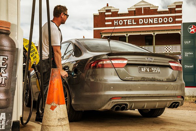 Nathan Ponchard filling up Ford XR8