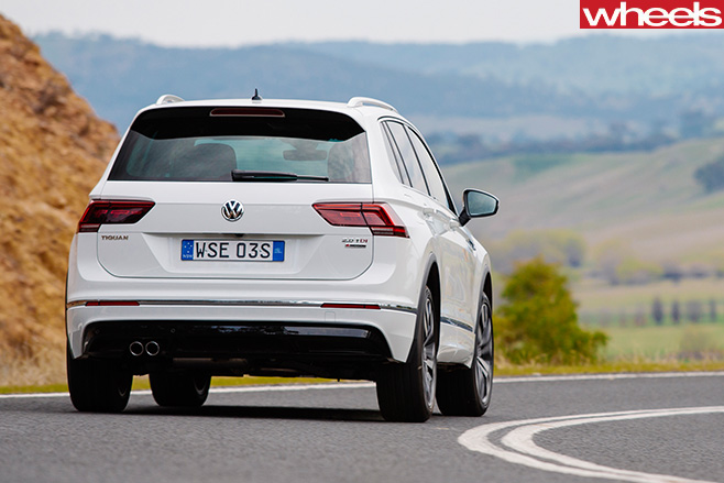 Volkswagen -Tiguan -R-Line -driving -rear -side