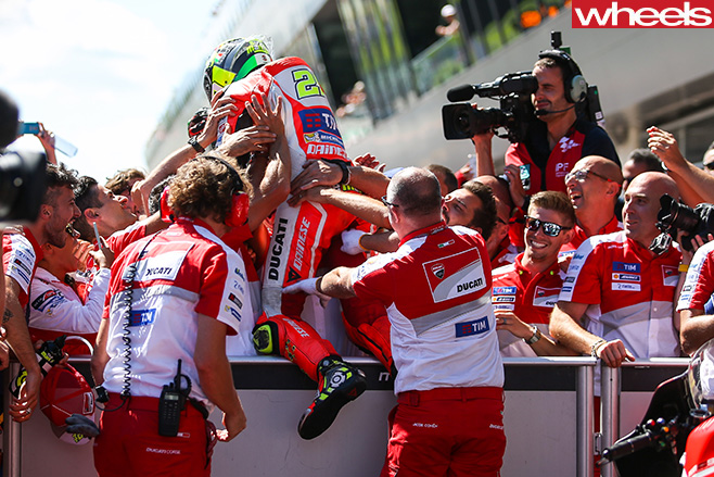 Andreas -Iannne -celebrates -in -crowd -2016-Austrian -Moto GP-track