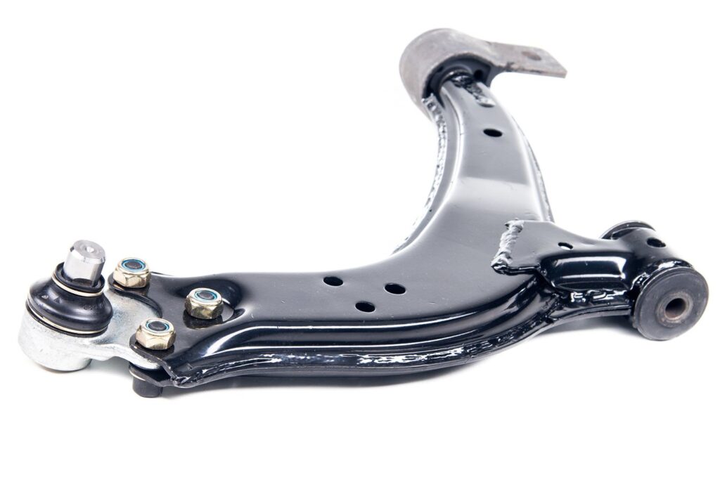 Car suspension arm with ball joint