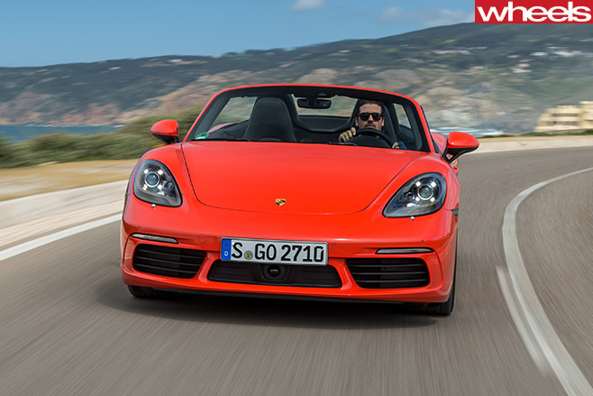 Orange -Porsche -918-Boxster -S-driving -front