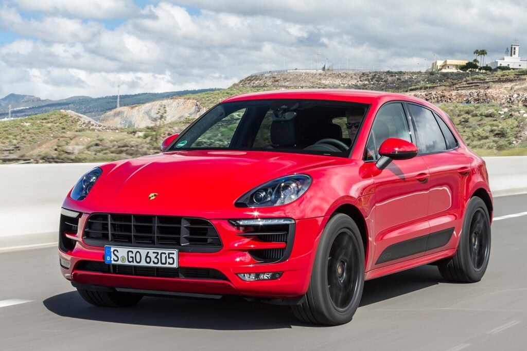 Red Porsche Macan Driving